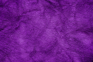 Close up of natural purple leather background. 