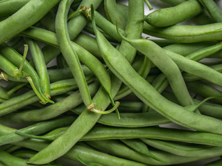 Fresh green organic pods beans. Vegetable background.