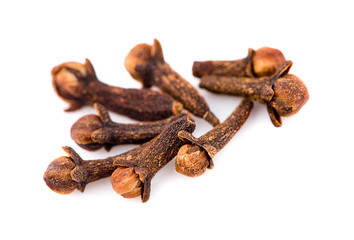 dry cloves on white background
