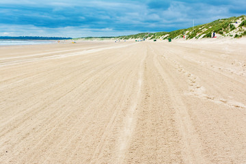 Fototapeta na wymiar Camber sands near Rye, East Sussex, United Kingdom, sand dunes and beach, selective focus