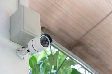 Camera security on the wall with controlled box at house