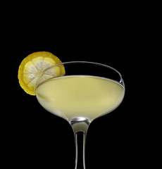 martini glass cocktail on a black background