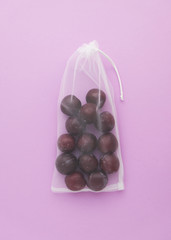 Natural Organic Plums in Shopping Net Bag Top View