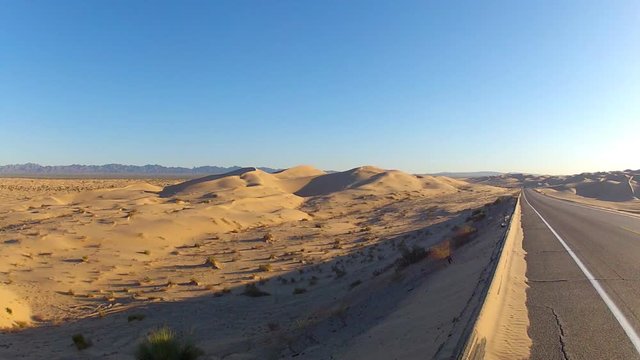 Empty Highway Through Algondones Sand Dunes- Glamis California