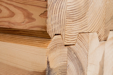 Wood Glued timber close up. Wooden grain timber end background. Glued pine timber beams. Wood for...