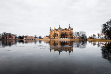 Schwerin, Germany. Schwerin Castle Palace (Schweriner Schloss), reflected on Schweriner See lake, a World Heritage Site in Mecklenburg-West Pomerania