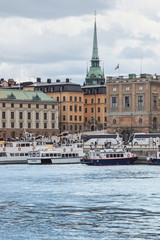 Fototapeta premium Cityscape of old town with blue ocean in Stockholm, Sweden