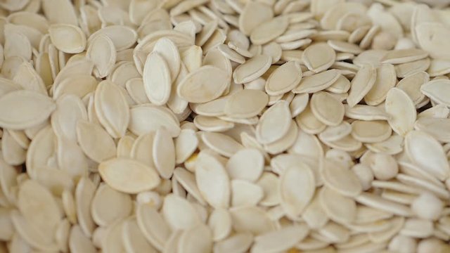 expanse of toasted and salted bruscolini. Pumpkin seeds, snacks, flavor