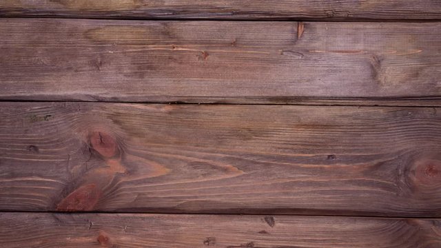 Stop motion of eating a hamburger. It appears o the plate, then someone eats it. Modern unhealthy fast food eating. No people in frame. 4k.