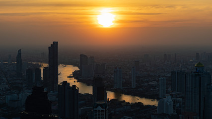 the metropolitan city is surrounded by dust smoke and pollution Bangkok Thailand