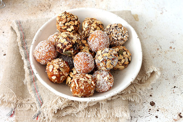 Raw vegan sweets, energy balls with dried fruits and nuts 