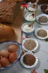 Ingredients for whole grain healthy bread, whole wheat flour, wheat germ and eggs 