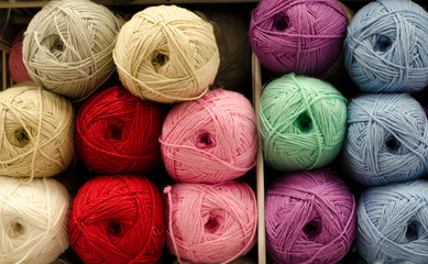 Colored balls of yarn. View from above. Rainbow colors. All colors. Yarn for knitting. Skeins of yarn.