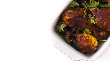 Roasted tandoori chicken isolated on white  background.Top view. Copyspace