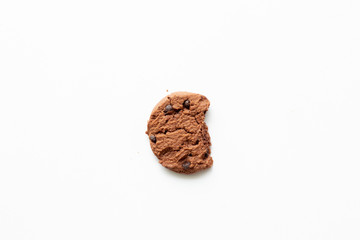 Chocolate chip cookie and bite missing,on white background.