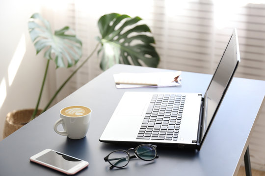 Feminine office space with a lot of ntural light.