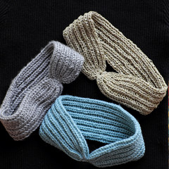 Fototapeta na wymiar handmade head bands knit in free time, accessories for woman