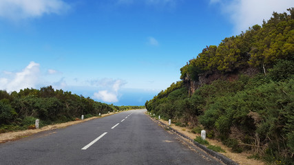 Fototapeta na wymiar Road in the heights of mountains and cliffs, Pico Ruivo. Highest point of the island of Madeira