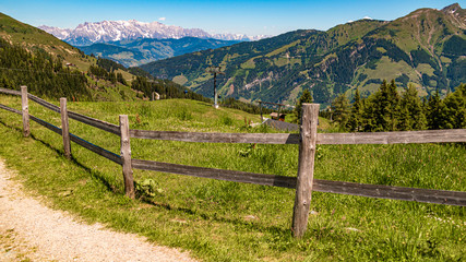 Fototapeta na wymiar Beautiful alpine view with a fence at Rauris, Salzburg, Austria