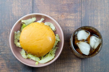 Homemade burger with delicious fresh ingredients and soft drink