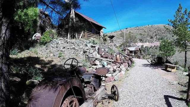 Old Cars And Cabins In Mining Ghost Town