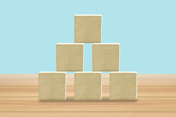 Wooden blocks stacking as staircase on white background. Success, growth, win, victory, development or top ranking concept.