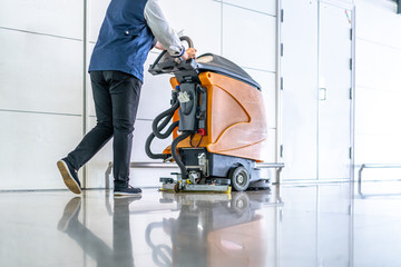 cleaning floor with machine - obrazy, fototapety, plakaty