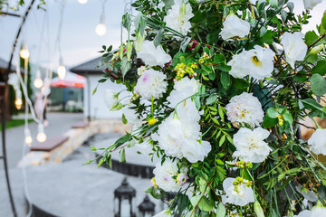 White flowers as decorations. Beautiful details at the wedding. Stylish bouquets.