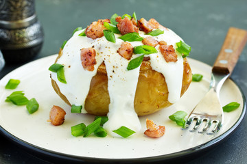 Stuffed baked potatoes with cheese and bacon.