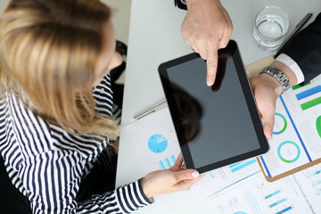 Business partners discussing terms of contract