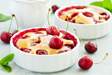 Cherry clafoutis - traditional French sweet fruit dessert.
