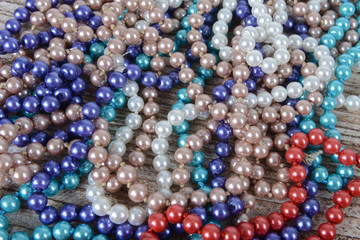Background of colorful beads on the table.