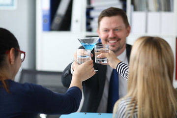 Cheerful managers in office
