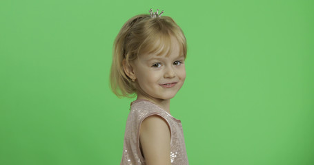 Girl in glossy dress. Happy four years old child. Chroma Key