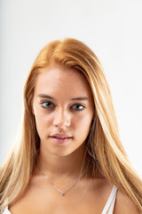 Attractive intense young woman staring at camera