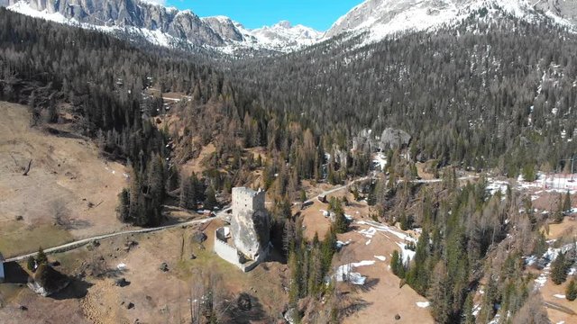 An old castle Castello di Andraz - forest and mountains - Dolomites, Italy