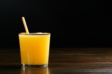 Orange juice and soda (schorle) in a tumbler glass