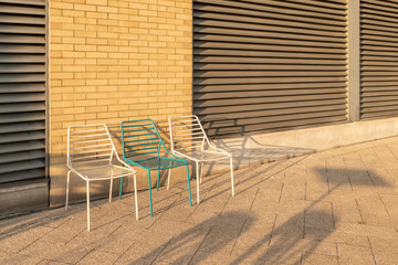 three chairs and shadows
