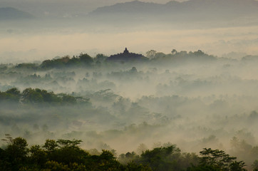 foggy morning Borobudur Budhist Temple java Indonesia