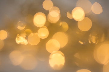 Christmas background, bokeh in dark colors, bokeh in purple and gold colors