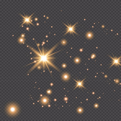 Fototapeta na wymiar Set of gold glowing light effects isolated on dark background. Glow light effect. Star exploded sparkles.