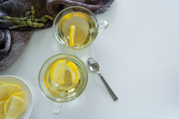 Top view of lemon tea glasses. Drinks flat lay. Seasonal refreshment break