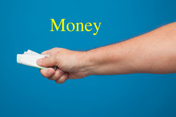 Mano con dinero o dinero en la mano de una persona adulta, acción de pagar o acción de cobrar....