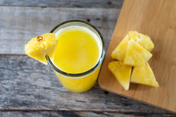 Pineapple juice with piece of fruit