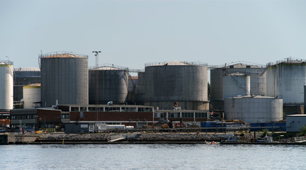 Plant for the processing of petroleum products and the production of fuel and lubricants. Fuel tanks on the shore.
