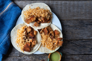 Mexican chicken milanese tacos with red rice
