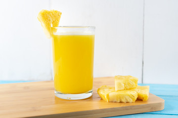Pineapple juice with piece of fruit
