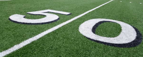 Obraz premium american football field 50 yardline marker number