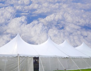 large white events or wedding tent on a summer cloudy day - 277934706