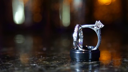 Slow move into engagement rings rack focus